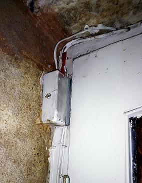 Secondary box that cables connect to, and then are routed out of the house.