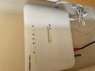 Main Open reach modem with the tel originally plugged into it