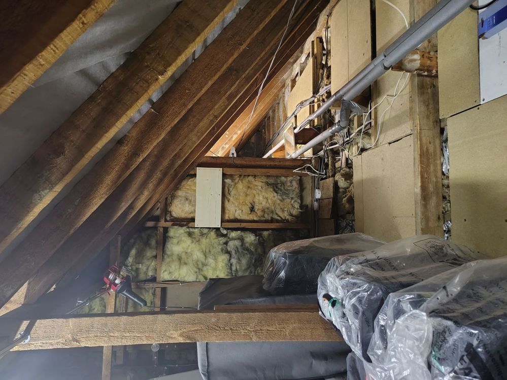 Stud wall of the dormer room at front.jpg